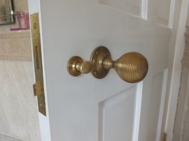 Aged Brass Door Knob & Horizontal Bathroom Lock